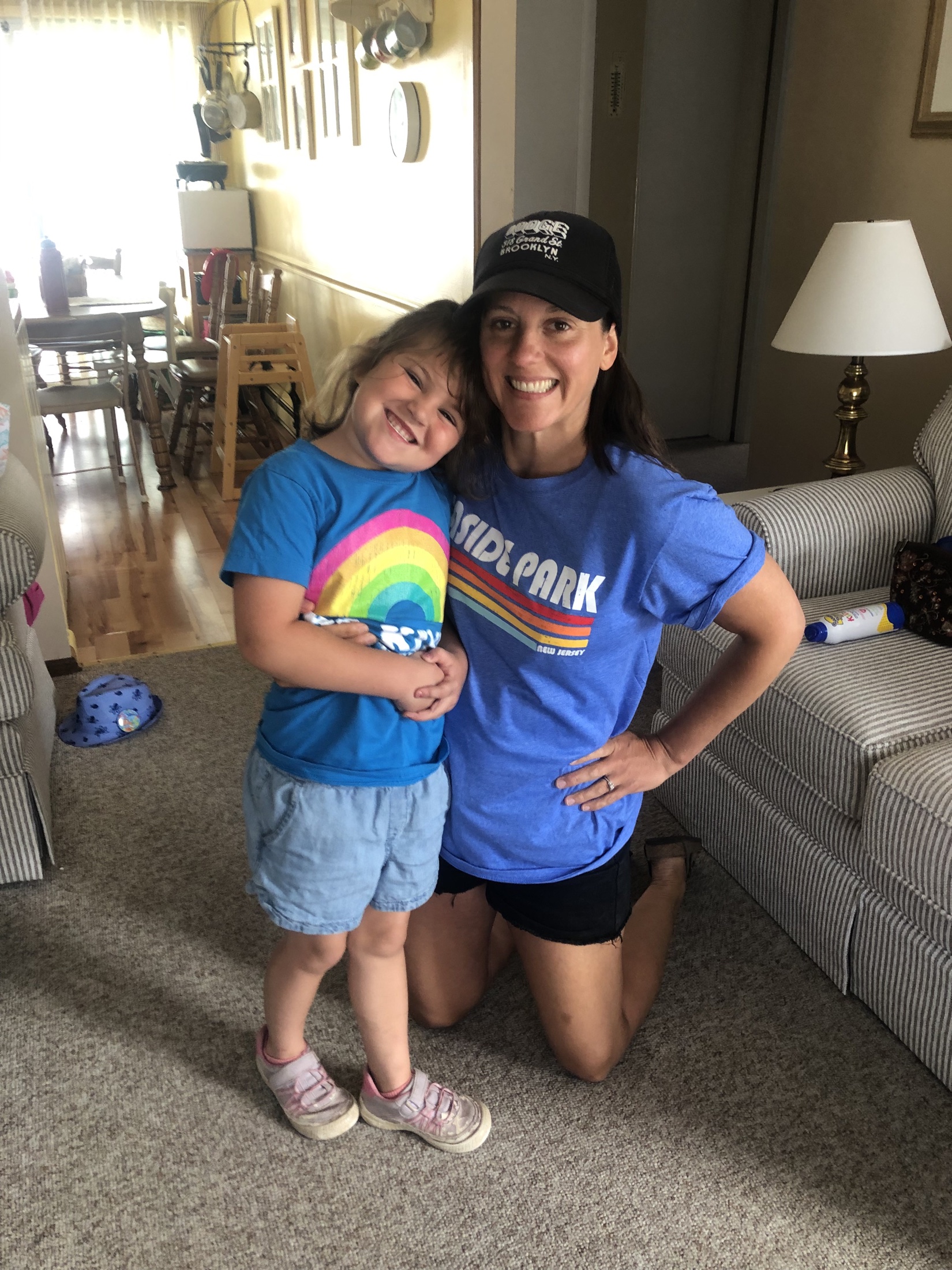 Carly smiling with one of her nieces